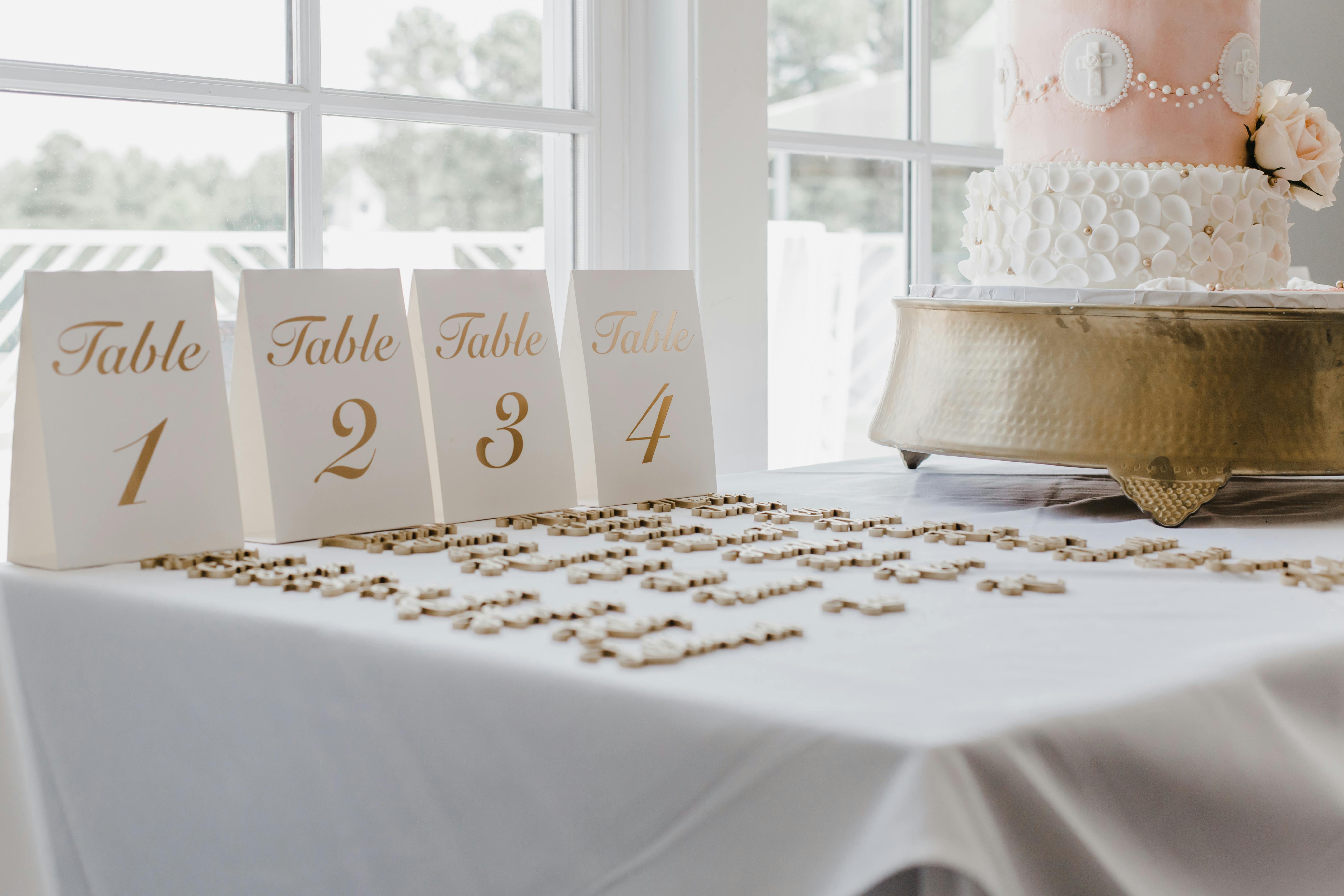 Elegant wedding table setting with gold accents and floral centerpieces